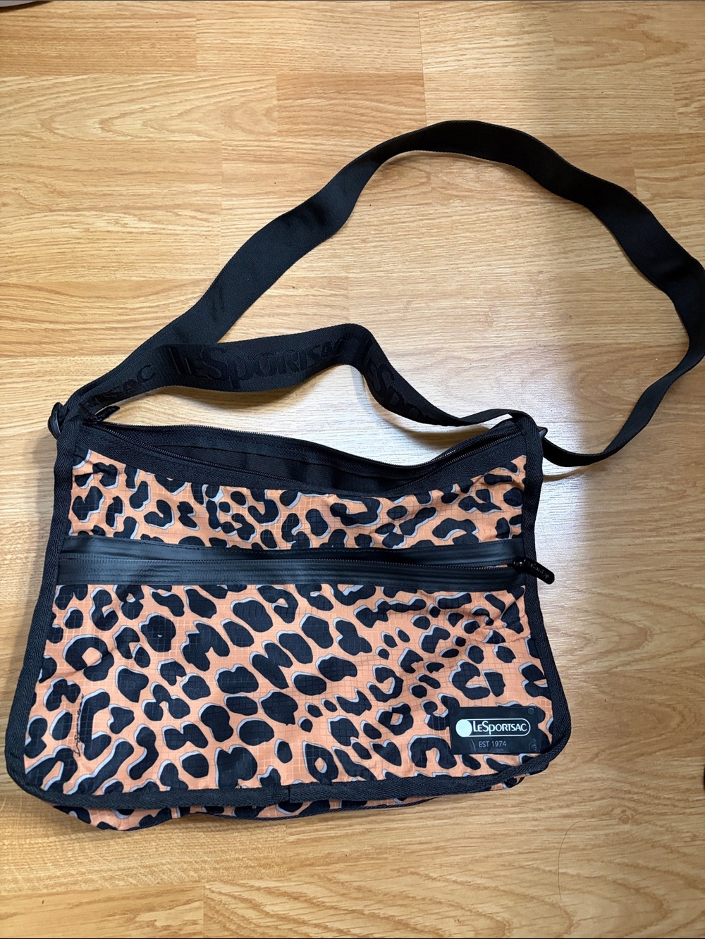 LeSportsac Leopard Print Crossbody Bag in Orange and Black